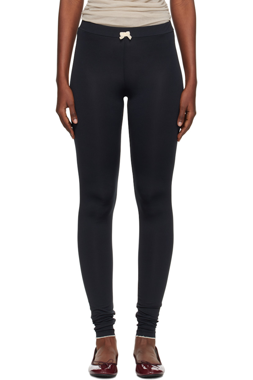 Stretch jersey leggings. 

· Velvet bow at elasticized waistband 
· Logo embroidered at back waist
· Contrast stitching in white

Supplier color: Black