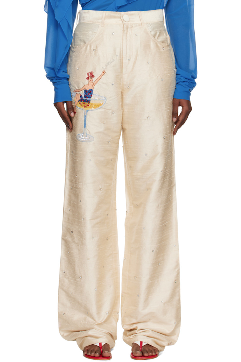 Handcrafted silk faille trousers.

· Sequins and beading throughout
· Belt loops
· Four-pocket styling
· Zip fly
· Logo graphic embroidered and beaded at front
· Crystal-cut logo at back pocket

Supplier color: White