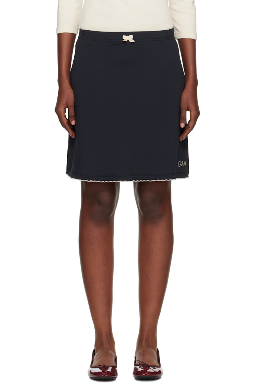 Stretch jersey miniskirt. 

· Velvet bow at elasticized waistband 
· Logo embroidered at front hem
· Contrast stitching in white

Supplier color: Black