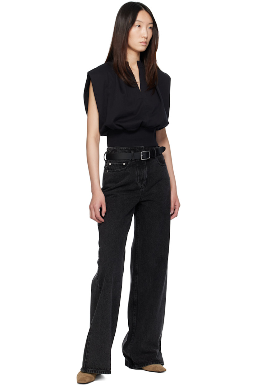 Buffed leather belt in black. 

· Rivet and keeper loop at length
· Pin-buckle fastening 
· Logo-engraved silver-tone hardware
· W1.25"

Supplier color: Black