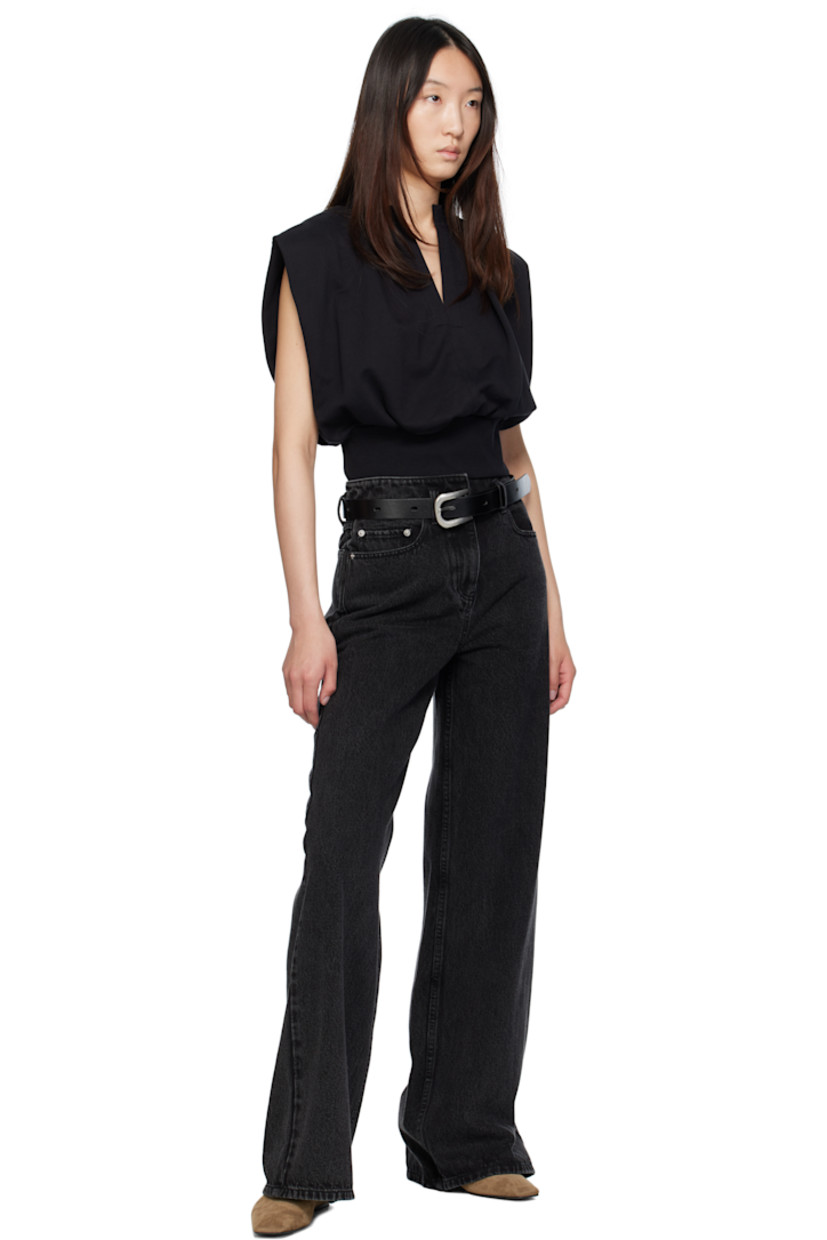 Buffed leather belt in black. 

· Rivet and keeper loop at length
· Pin-buckle fastening 
· Logo-engraved silver-tone hardware
· W1.5"

Supplier color: Black