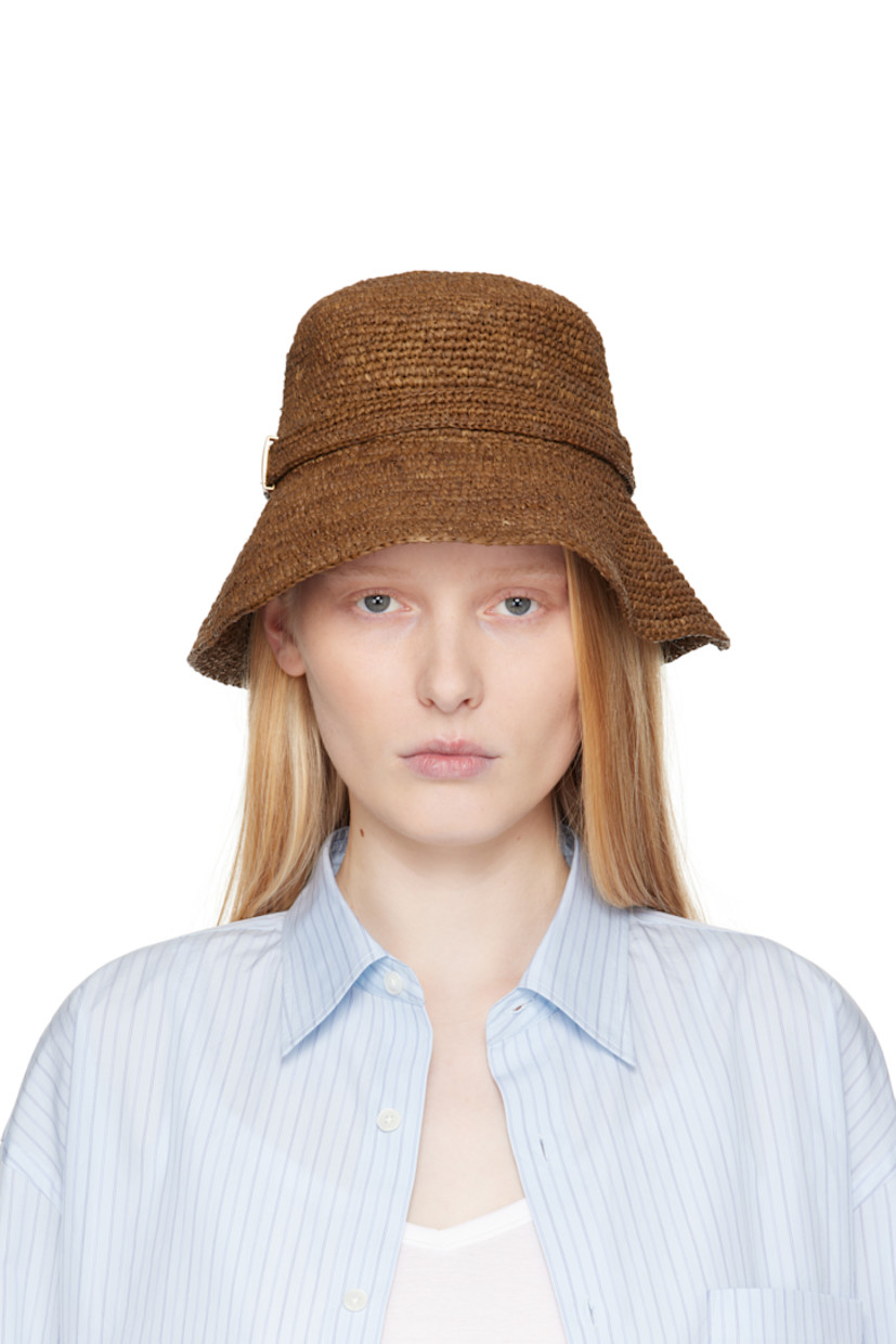 Woven raffia bucket hat in brown. 

· Strap with logo plaque
· Unlined

Supplier color: Brown