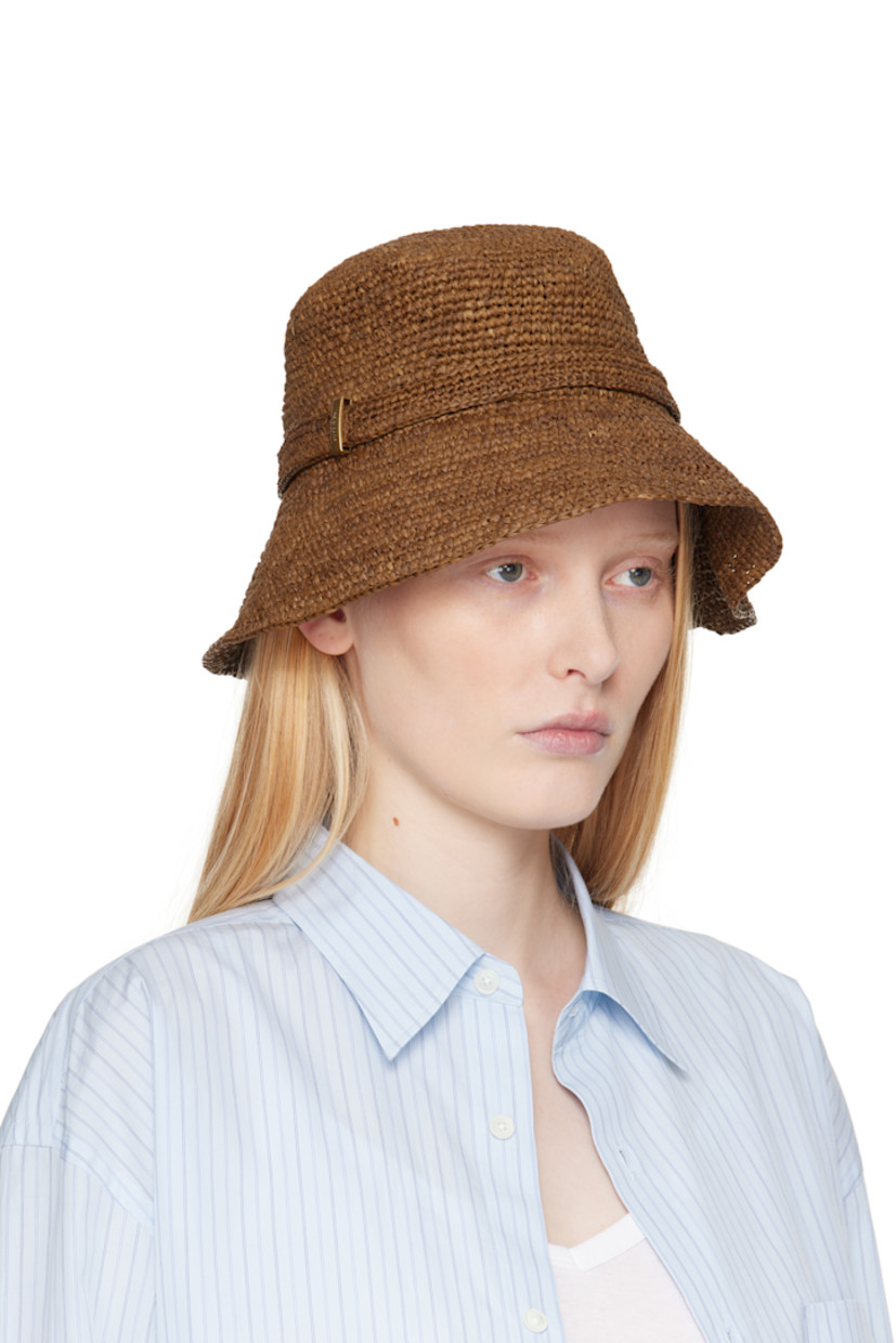 Woven raffia bucket hat in brown. 

· Strap with logo plaque
· Unlined

Supplier color: Brown