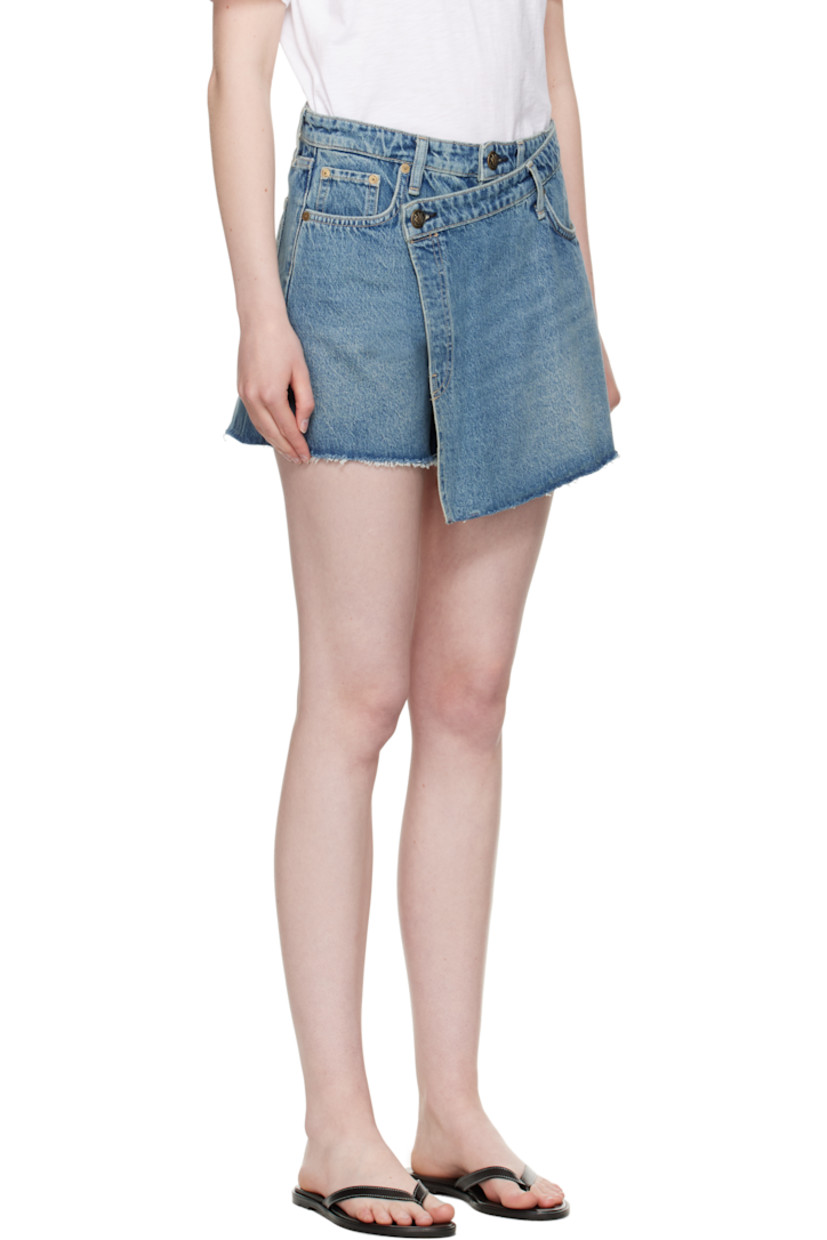 Lightweight non-stretch denim skort. Fading and whiskering throughout.

· Wrap construction
· Belt loops
· Five-pocket styling
· Zip fly
· Frayed edge at cuffs
· Logo patch at back waistband
· Logo embroidered at back pocket
· Contrast stitching in beige

Supplier color: Amity