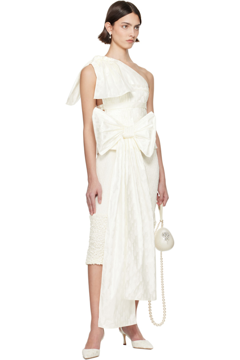Cotton satin top. Jacquard graphic pattern throughout.

· Single-shoulder construction
· Pleats at front
· Bow accent at front and shoulder strap
· Button closure at side seam

Part of the exclusive SSENSE Bridal capsule.

Supplier color: Off white
