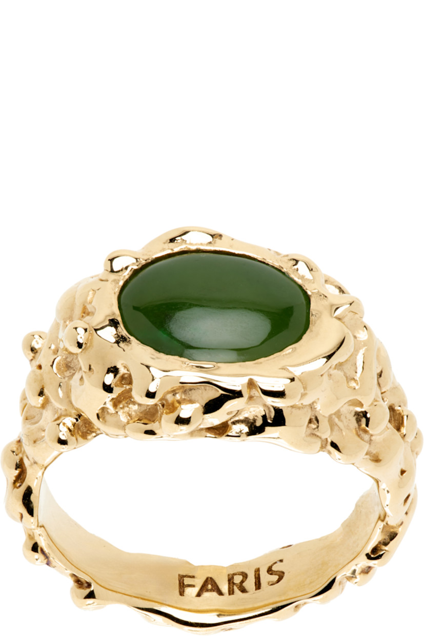 Handcrafted textured signet ring in 14k gold-plated bronze. 

· Jade stone at face 
· Logo engraved at inner band

Supplier color: 14k gold-plated