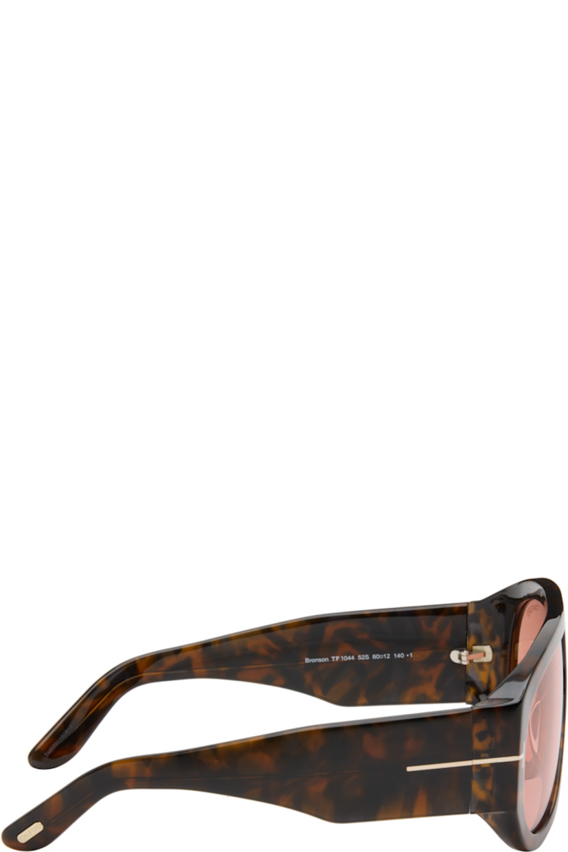Aviator-style tortoiseshell acetate-frame sunglasses.

· Integrated nose pads
· Red-brown tone lenses
· 100% UV protection
· Etched logo at single lens
· Logo hardware at hinges
· Core wire at temples
· Logo hardware at temples
· Velvet case included
· Size: 60.12 140 

Supplier color: Brown