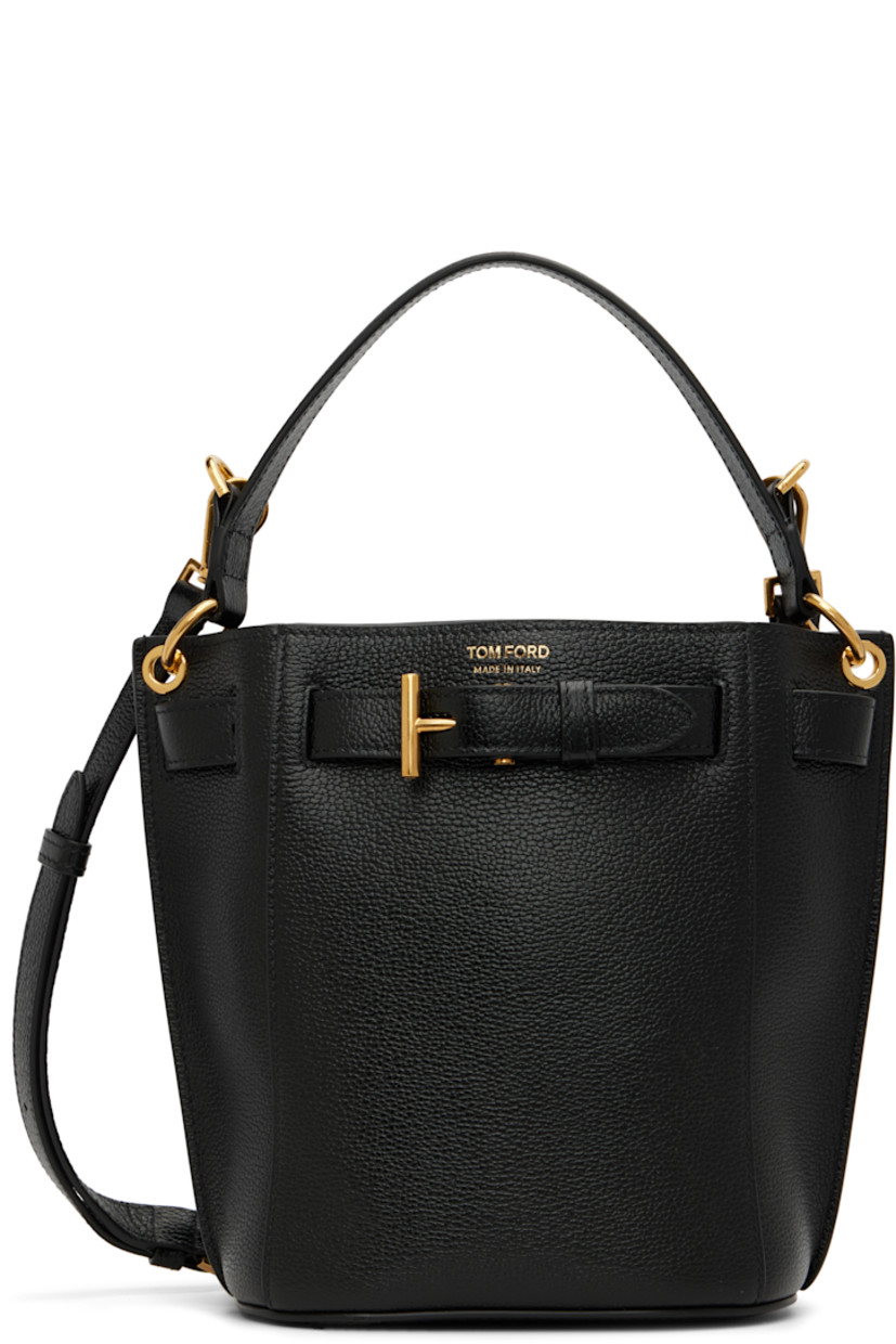 Grained calfskin shoulder bag.

· Fixed carry handle
· Adjustable and detachable shoulder strap
· Logo stamp at face
· Logo hardware at pin-buckle strap
· Open throat
· Patch pocket at interior
· Faux-suede lining
· Logo-engraved gold-tone hardware
· H8" x W6.75" x D4.75"

Supplier color: Black