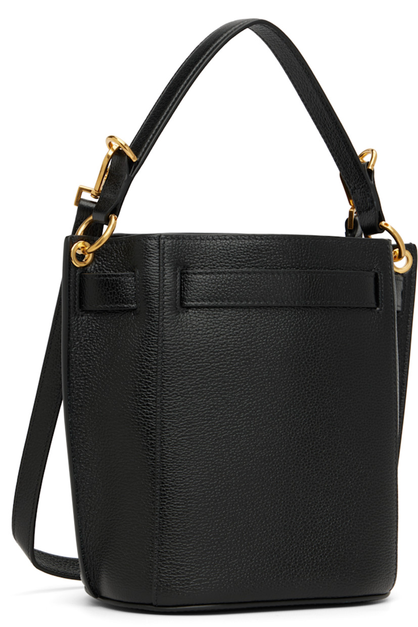 Grained calfskin shoulder bag.

· Fixed carry handle
· Adjustable and detachable shoulder strap
· Logo stamp at face
· Logo hardware at pin-buckle strap
· Open throat
· Patch pocket at interior
· Faux-suede lining
· Logo-engraved gold-tone hardware
· H8" x W6.75" x D4.75"

Supplier color: Black