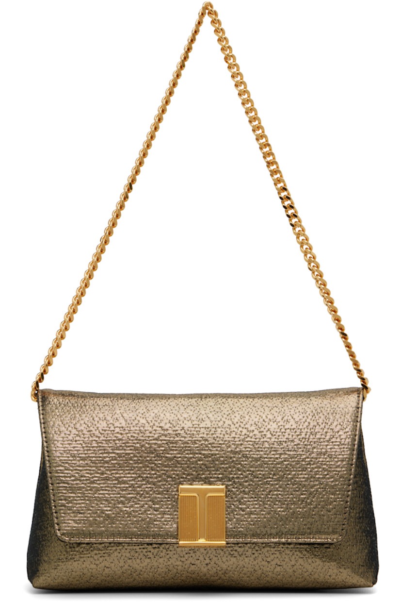 Woven lamé shoulder bag.

· Detachable curb chain shoulder strap
· Foldover flap with logo hardware
· Magnetic press-stud fastening
· Satin lining
· H4.5" x W8" x D3"

Supplier color: Dark Gold