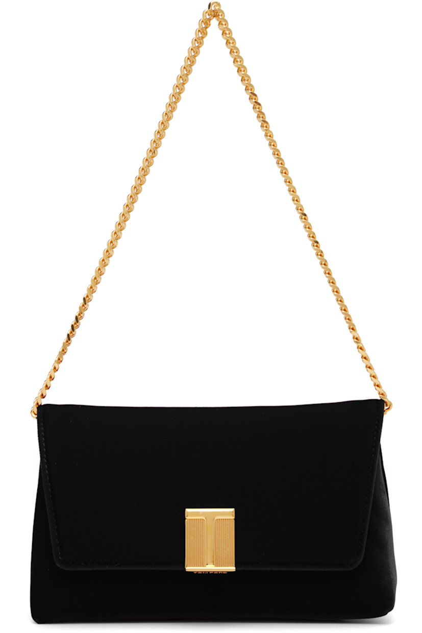 Velvet shoulder bag. 

· Detachable curb chain shoulder strap
· Logo hardware at face
· Magnetic press-stud flap
· Satin lining
· Gold-tone hardware
· H4.5" x W7.5" x D2.5"

Supplier color: Black