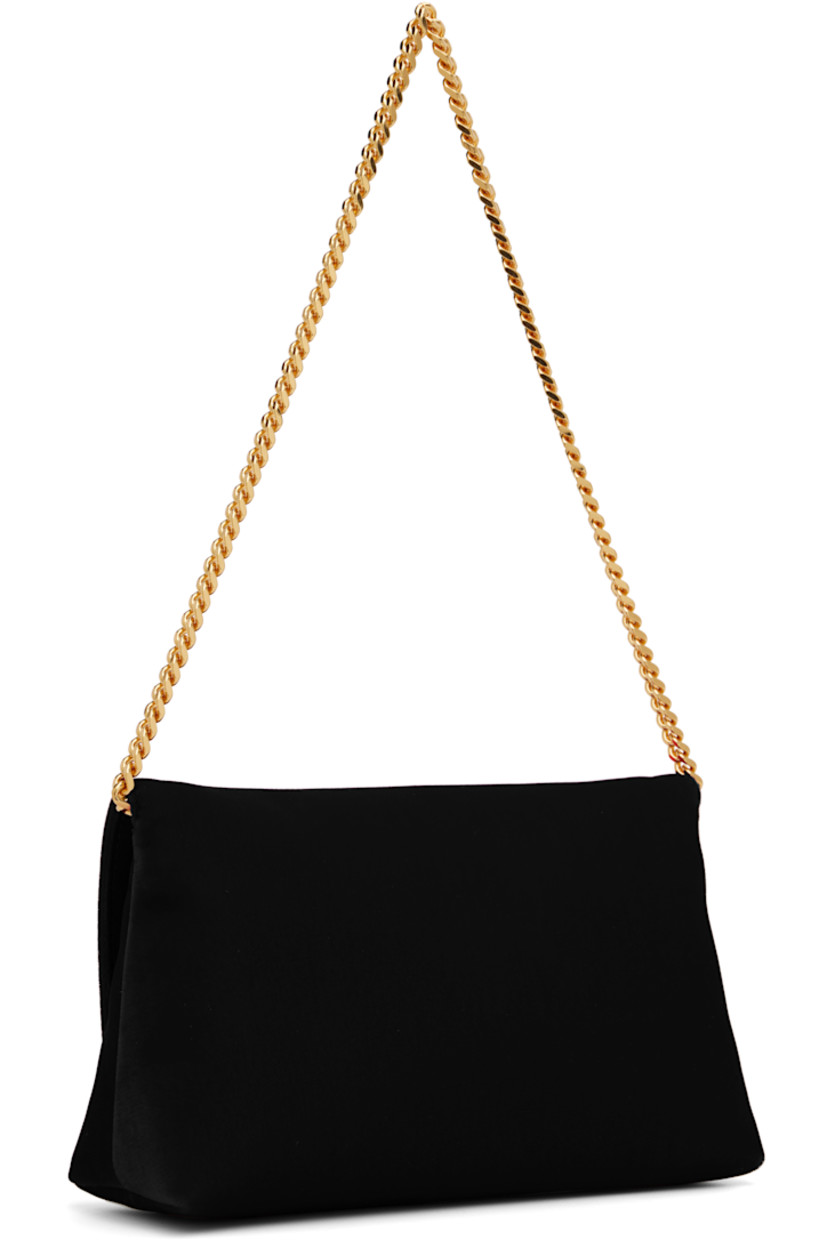 Velvet shoulder bag. 

· Detachable curb chain shoulder strap
· Logo hardware at face
· Magnetic press-stud flap
· Satin lining
· Gold-tone hardware
· H4.5" x W7.5" x D2.5"

Supplier color: Black