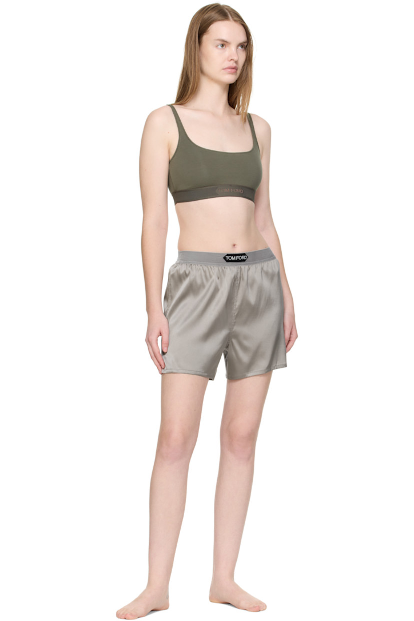Stretch silk satin shorts.

· Logo patch at velour elasticized waistband
· Vented cuffs

Supplier color: Dark silver