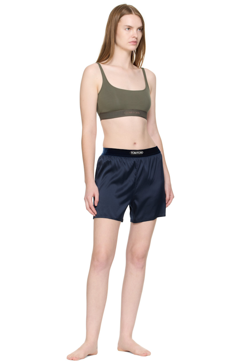 Stretch silk satin shorts.

· Logo patch at velour elasticized waistband
· Vented cuffs

Supplier color: Dark navy