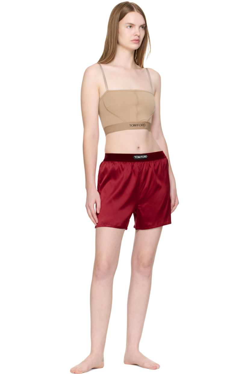 Stretch silk satin shorts.

· Logo patch at velour elasticized waistband
· Vented cuffs

Supplier color: Crimson