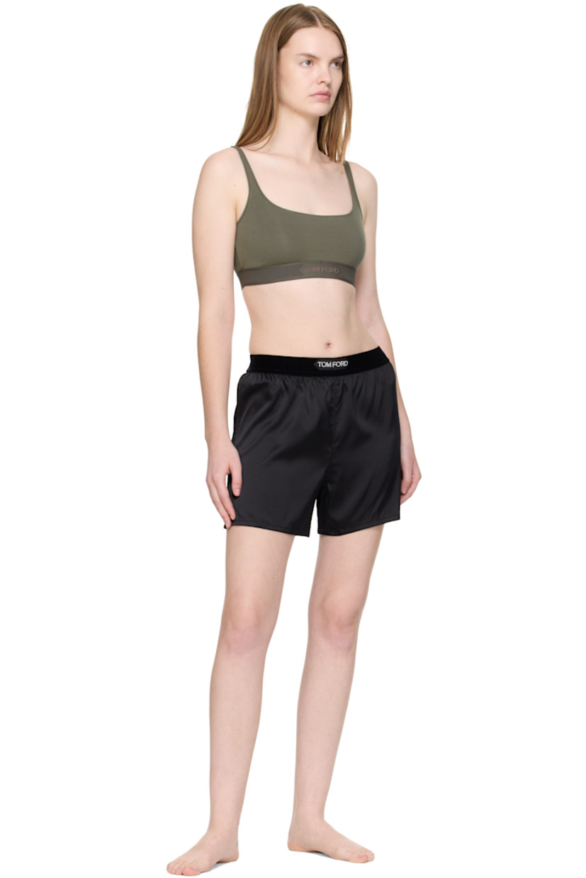 Stretch silk satin shorts.

· Logo patch at velour elasticized waistband
· Vented cuffs

Supplier color: Black