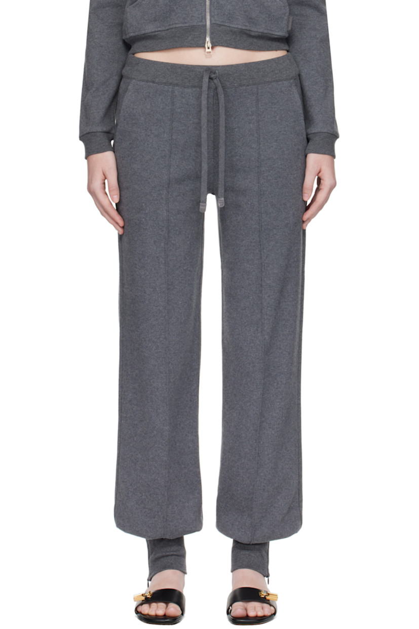 Peached cotton jersey lounge pants.

· Drawstring at elasticized waistband
· Three-pocket styling
· Mock fly
· Pinched seam at front and back legs
· Zip vent at rib-knit cuffs
· Leather logo flag at back pocket

Supplier color: Dark grey melange