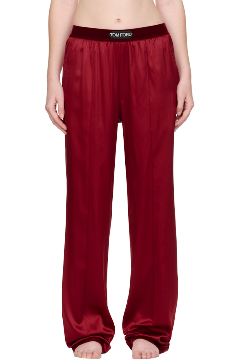 Stretch silk satin lounge pants.

· Loose-fit
· Logo patch at velour elasticized waistband
· Four-pocket styling
· Pinched seams at legs

Supplier color: Crimson