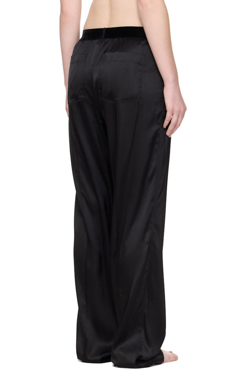 Stretch silk satin lounge pants.

· Loose-fit
· Logo patch at velour elasticized waistband
· Four-pocket styling
· Pinched seams at legs

Supplier color: Black