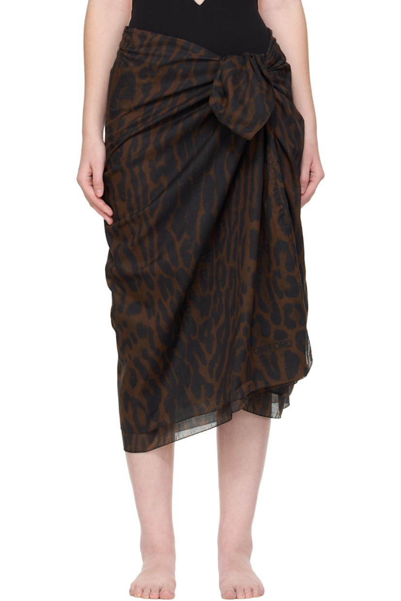 Cotton muslin cover-up skirt.

· Leopard pattern printed throughout
· Wrap construction
· Self-tie closure

Supplier color: Brown/Black