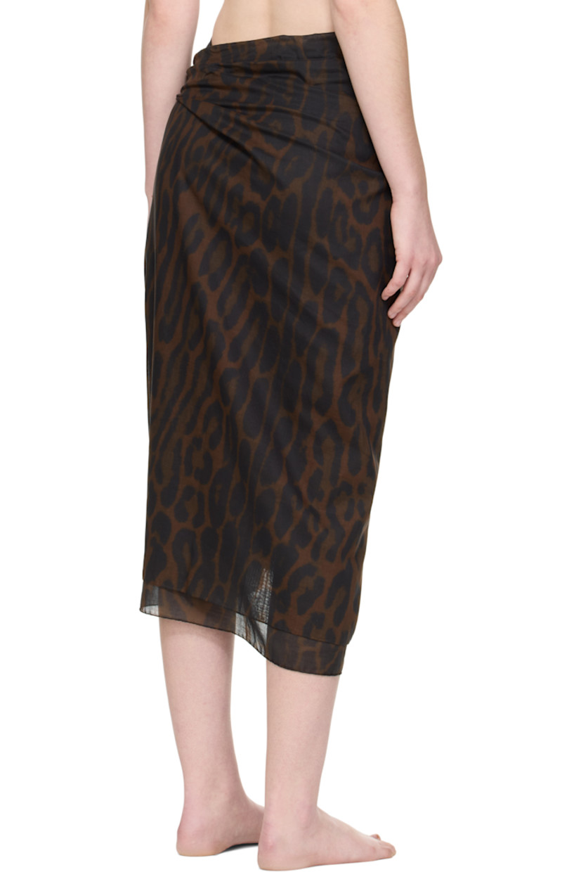 Cotton muslin cover-up skirt.

· Leopard pattern printed throughout
· Wrap construction
· Self-tie closure

Supplier color: Brown/Black