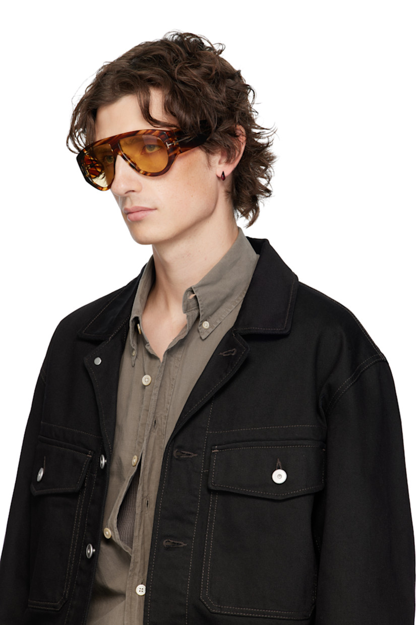 Aviator-style tortoiseshell acetate-frame sunglasses.

· Integrated nose pads
· Tinted yellow lenses with 100% UV protection
· Etched logo at single lens
· Logo hardware at hinges
· Logo hardware at temples
· Velvet case included
· Size: 60.12 140 

Supplier color: Shiny Striped Havana