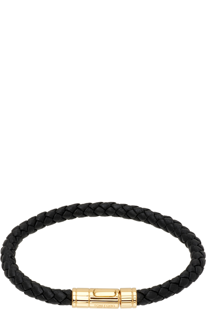 Braided grained calfskin bracelet.

· Logo-engraved press-stud closure
· Gold-tone brass hardware

Supplier color: Black