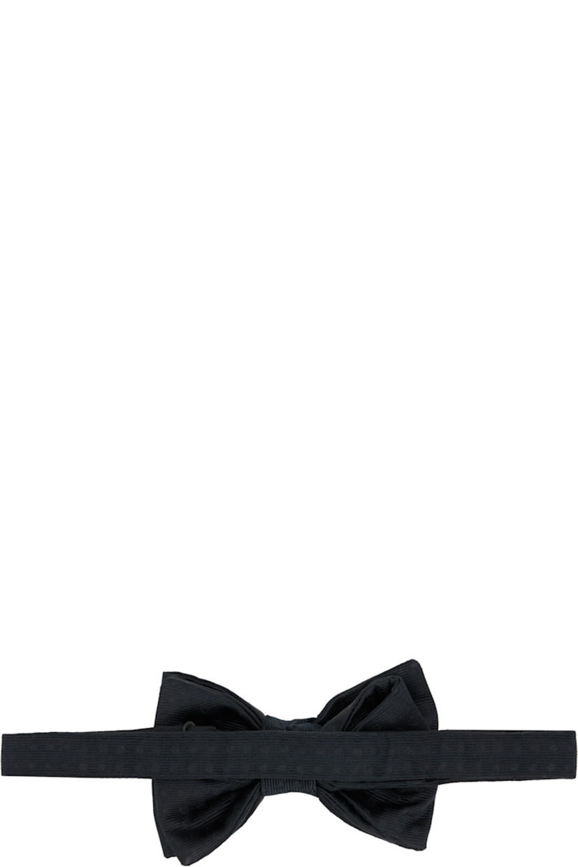 Silk grosgrain bow tie. 

· Jacquard polka-dot pattern throughout 
· Adjustable hook-eye fastening
· W1"

Supplier color: Black