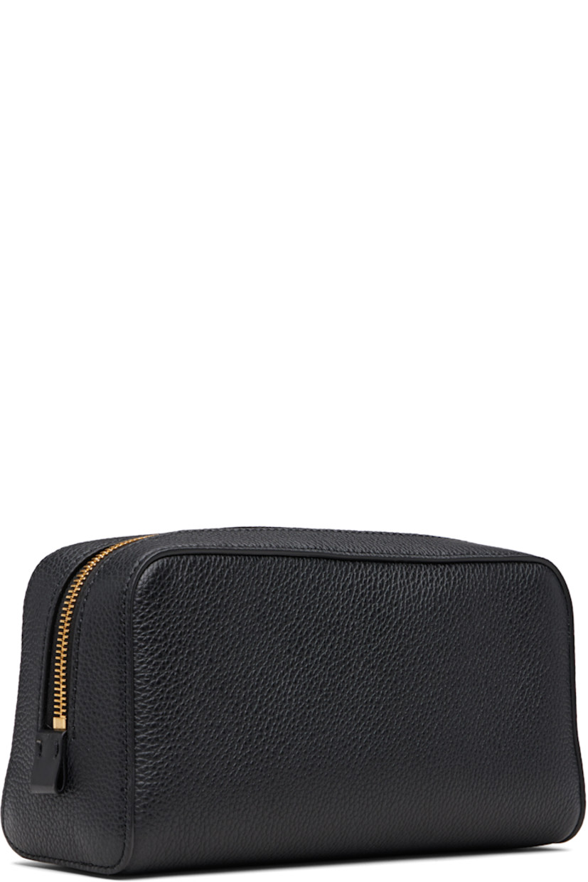 Grained leather pouch.

· Zip pocket and logo stamp at face
· Zip closure
· Patch pocket at interior
· Twill lining
· H5" x W9" X D3.5"

Supplier color: Black