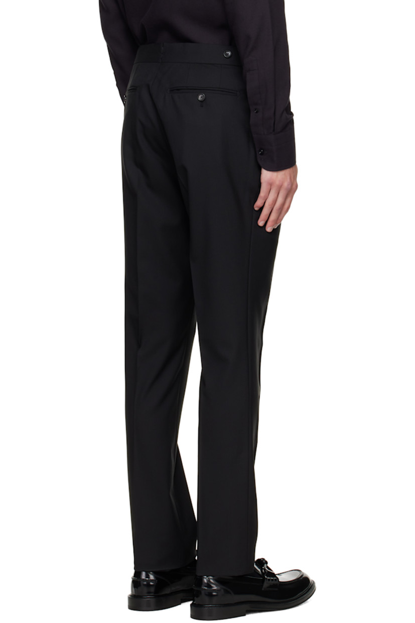 Plain-woven wool trousers.

· Cinch tabs at waistband
· Four-pocket styling
· Zip fly
· Creased legs
· Unfinished cuffs
· Buttons and notch at back waistband
· Partial satin lining

Supplier color: Black