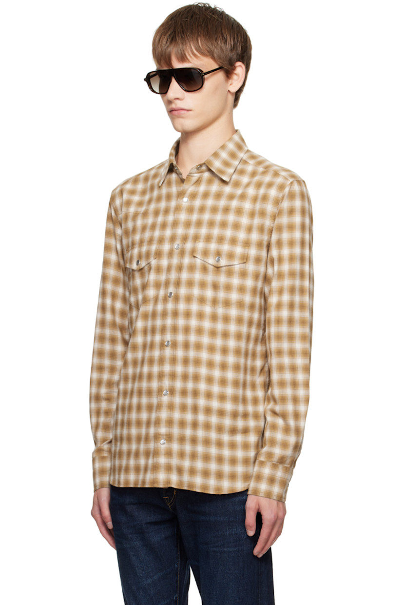 Cotton flannel shirt.

· Check pattern throughout
· Spread collar
· Press-stud closure
· Western yoke at front and back
· Flap pockets at chest
· Shirttail hem
· Press-stud barrel cuffs

Supplier color: Combo beige/Brown