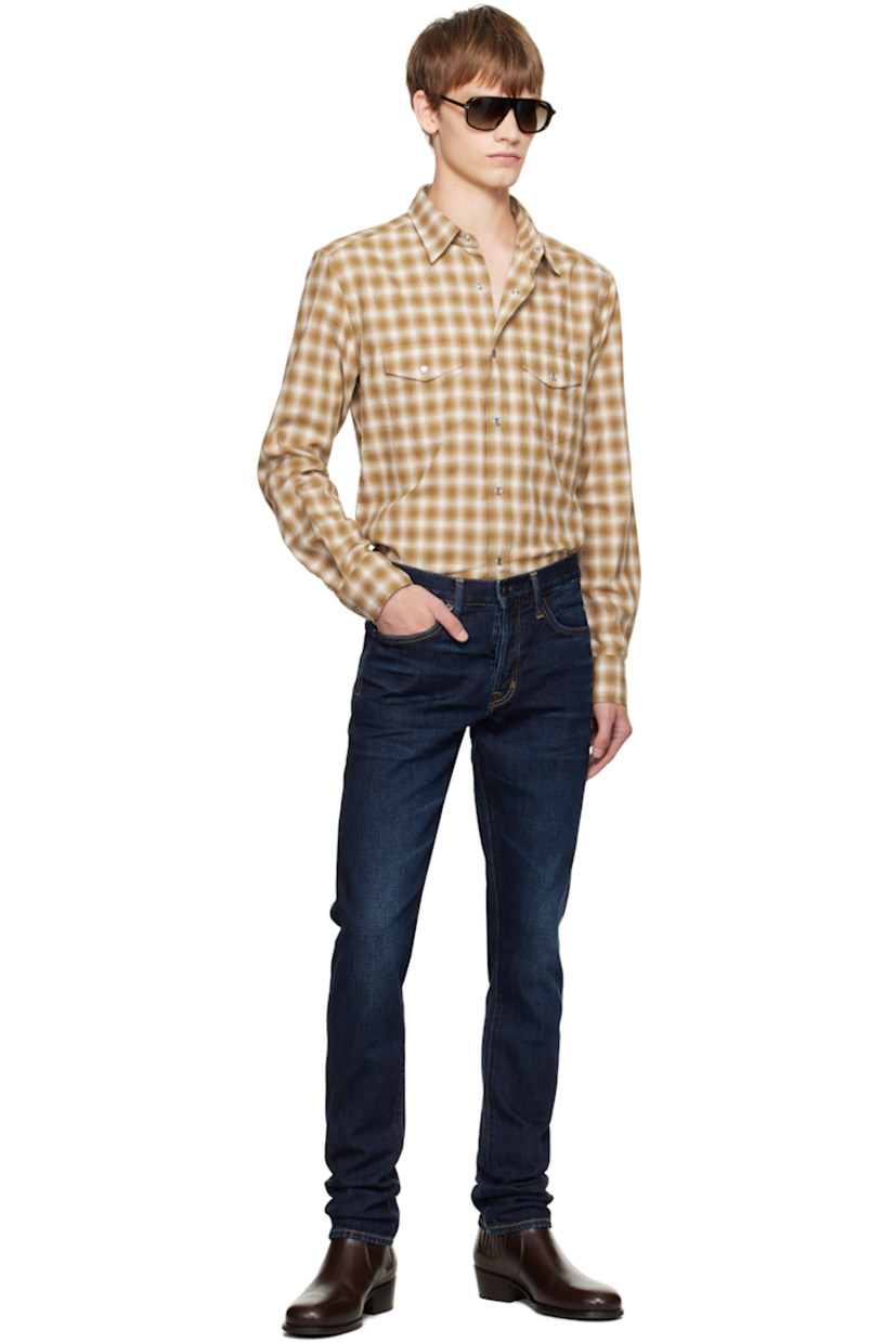Cotton flannel shirt.

· Check pattern throughout
· Spread collar
· Press-stud closure
· Western yoke at front and back
· Flap pockets at chest
· Shirttail hem
· Press-stud barrel cuffs

Supplier color: Combo beige/Brown