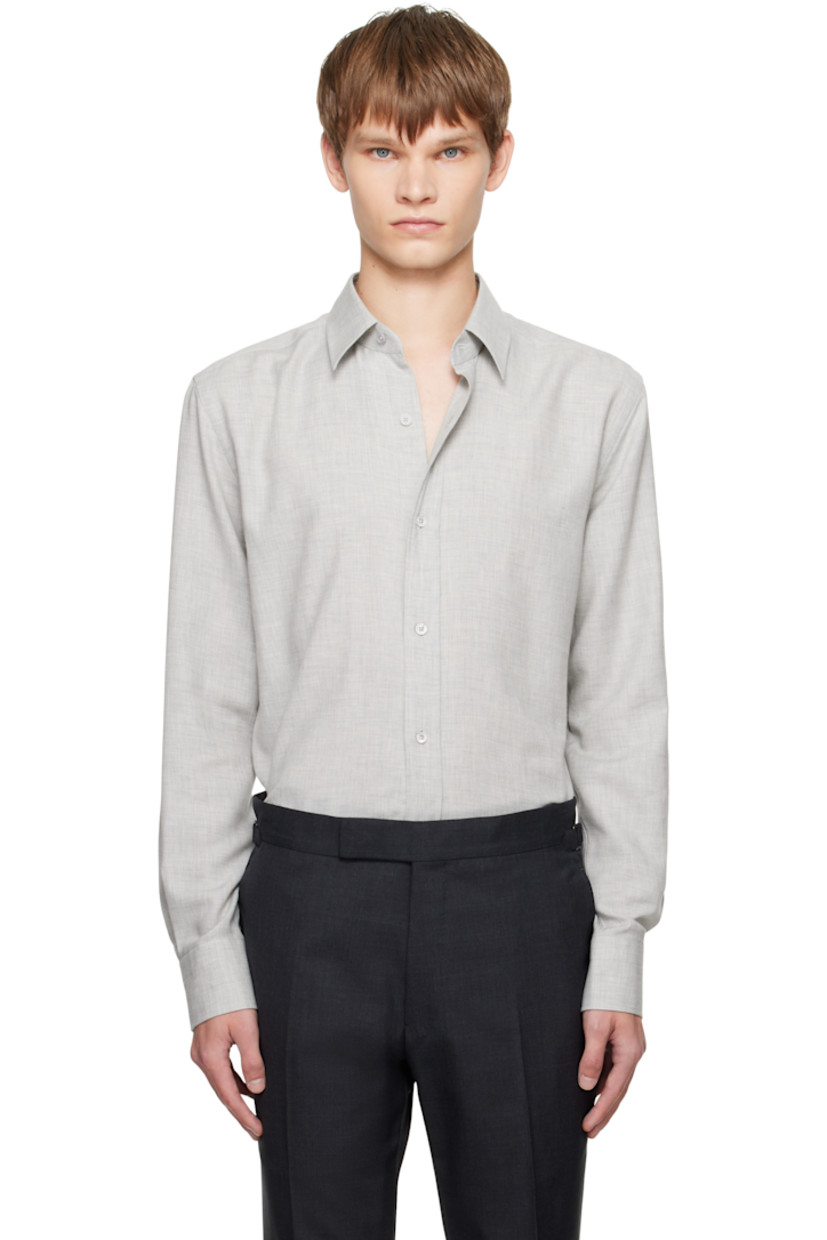 Cotton- and cashmere-blend twill shirt.

· Spread collar
· Button closure
· Shirttail hem
· Buttoned barrel cuffs
· Mother-of-pearl hardware

Supplier color: Grey