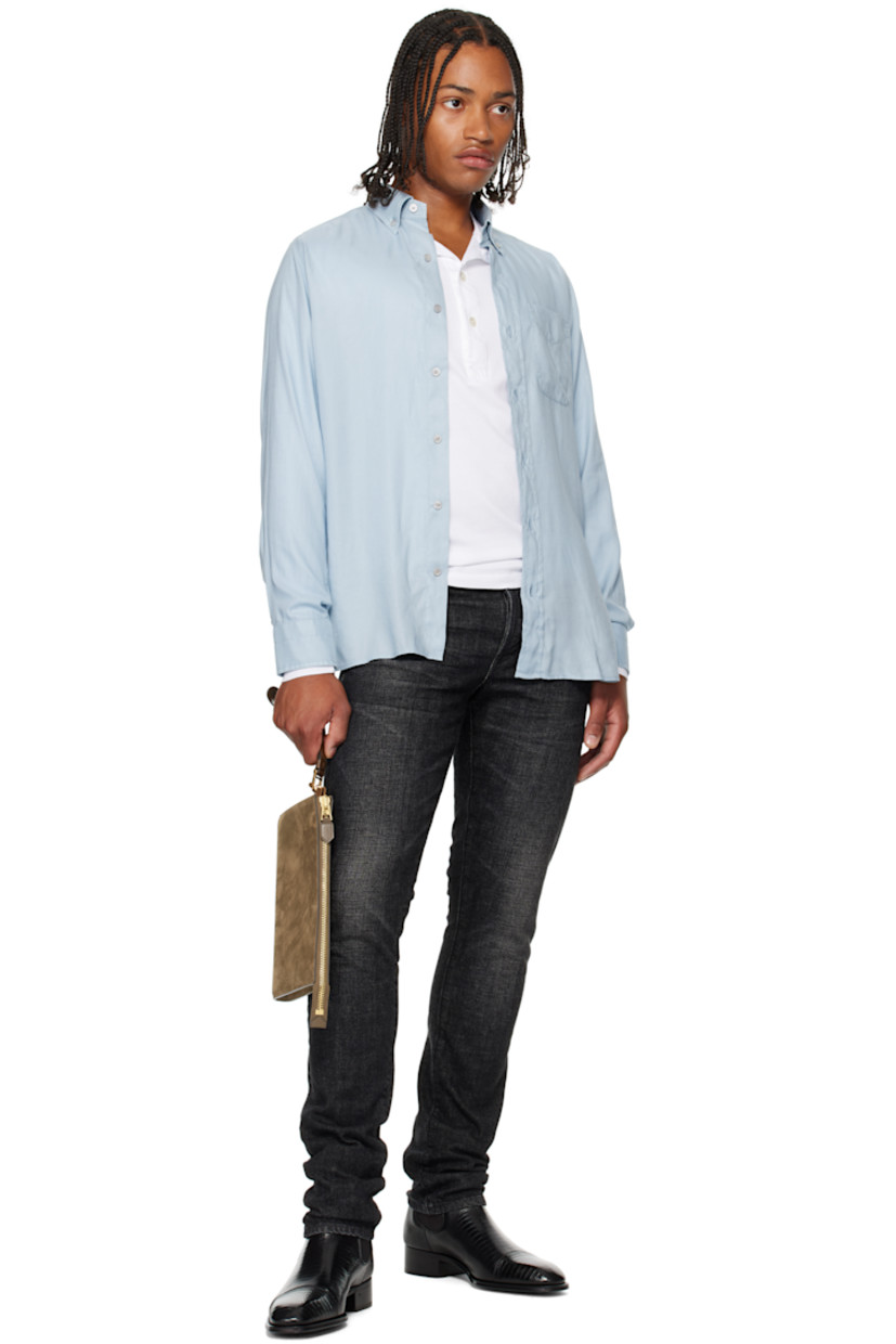 Lyocell gabardine shirt. 

· Button-down spread collar 
· Button closure
· Flap pocket at chest 
· Shirttail hem
· Pleats at buttoned barrel cuffs

Supplier color: Sky blue