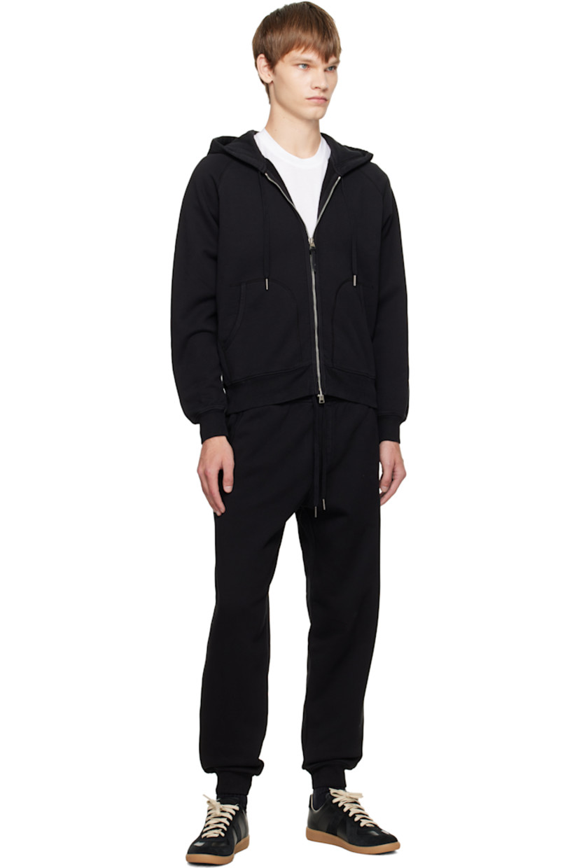 Cotton fleece hoodie. 

· Drawstring at hood
· Two-way zip closure
· Patch pockets at front
· Logo patch at front hem
· Rib-knit hem and cuffs
· Raglan sleeves
· Logo-engraved silver-tone hardware

Supplier color: Black