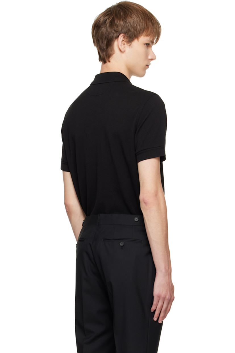 Lyocell- and cotton-blend piqué polo.

· Rib-knit spread collar and cuffs
· Three-button placket
· Logo embroidered at front hem 
· Tennis-tail hem

Supplier color: Black