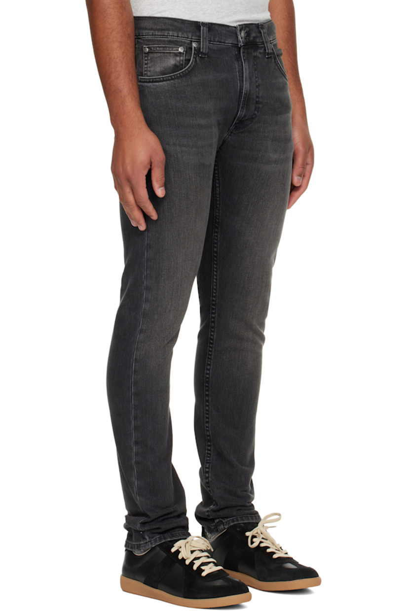 11.75 oz stretch organic cotton denim jeans.

· Fading and whiskering throughout
· Tapered, slim-fit
· Mid-rise
· Belt loops
· Five-pocket styling
· Zip fly
· Logo patch at back waistband and pocket

Supplier color: Black eyes