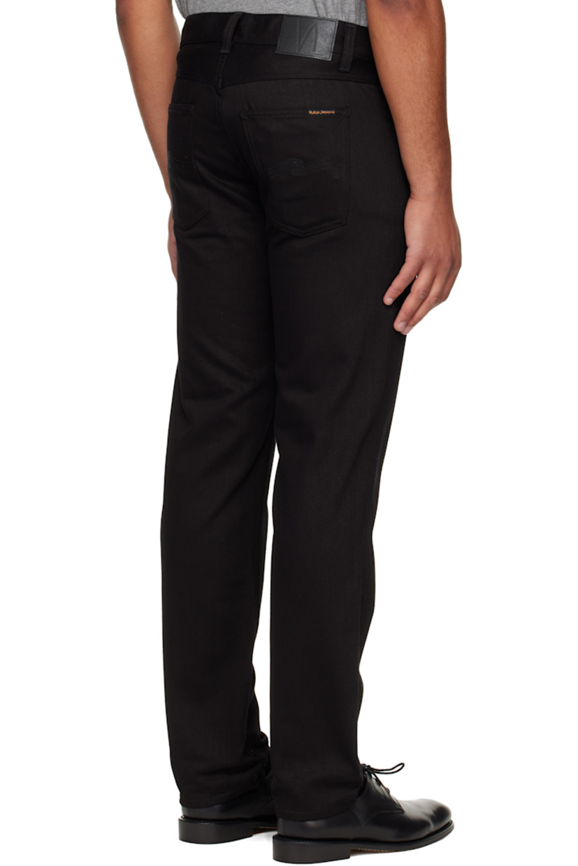 11.2 oz non-stretch organic cotton denim jeans.

· Straight-leg
· Mid-rise
· Belt loops
· Five-pocket styling
· Zip fly
· Logo patch at back waistband and pocket

Supplier color: Dry everblack