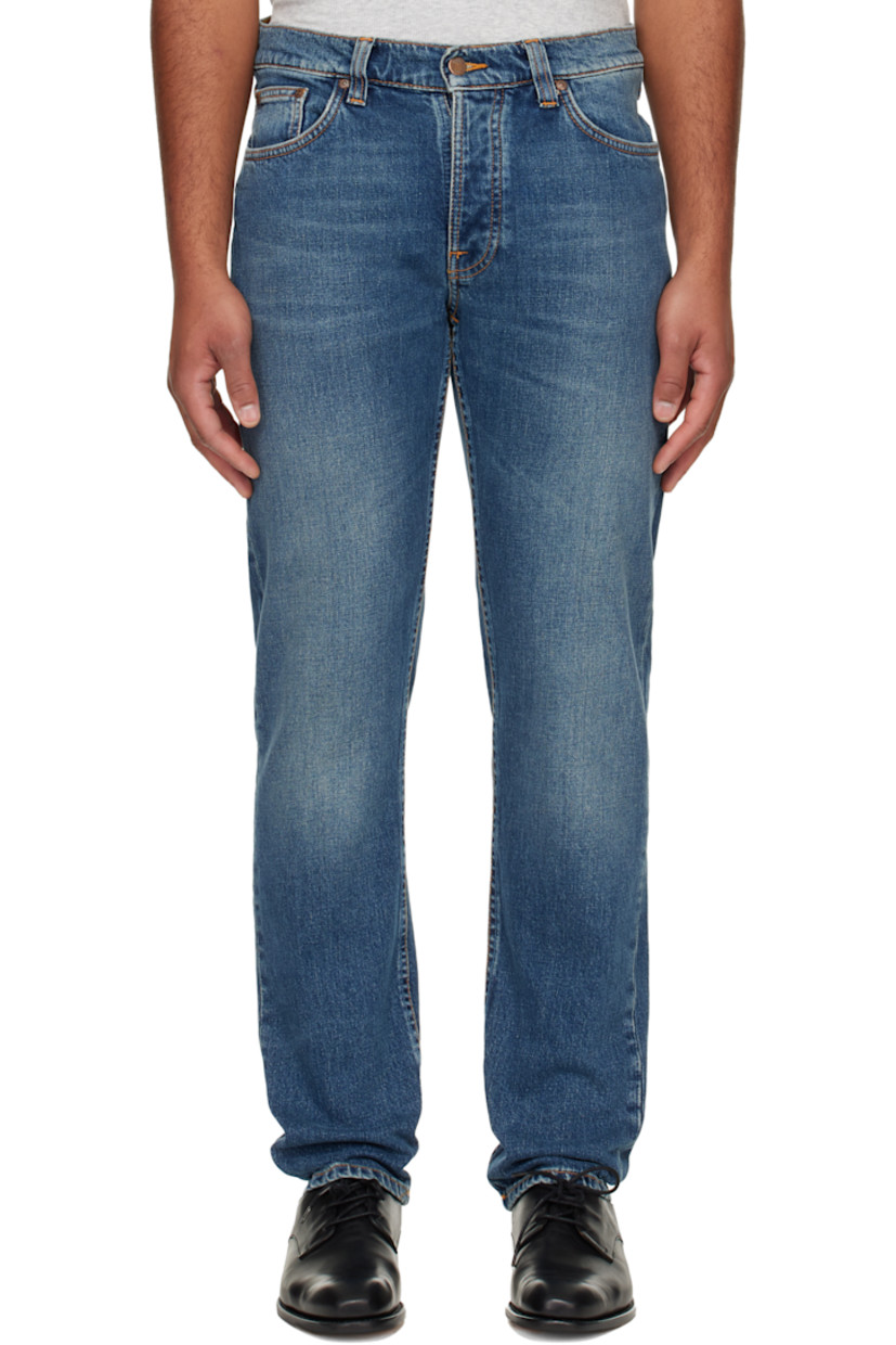13 oz stretch organic cotton denim jeans.

· Fading and whiskering throughout
· Slim-fit
· Mid-rise
· Belt loops
· Five-pocket styling
· Zip fly
· Logo patch at back waistband and pocket
· Contrast stitching in tan

Supplier color: Wild blue