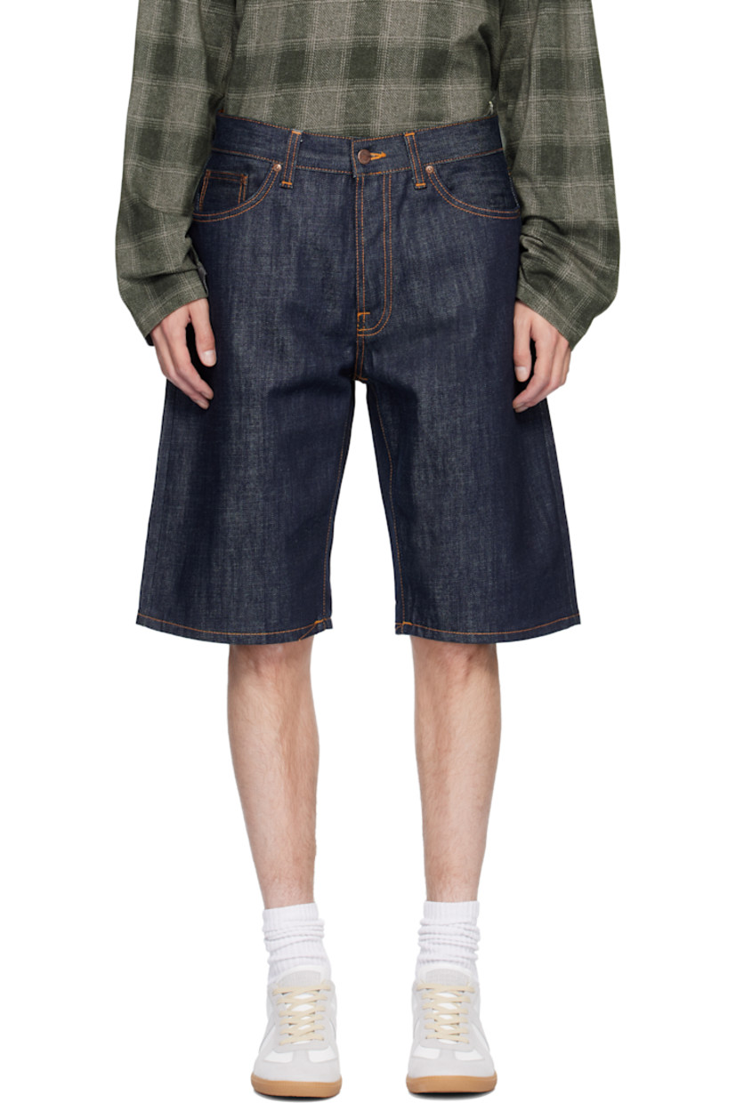13.7 oz non-stretch organic cotton denim shorts.

· Loose-fit, wide-leg
· High-rise 
· Belt loops
· Five-pocket styling
· Button fly 
· Logo patch at back waistband 
· Logo flag at back pocket
· Contrast stitching in tan

Supplier color: Dry streaky