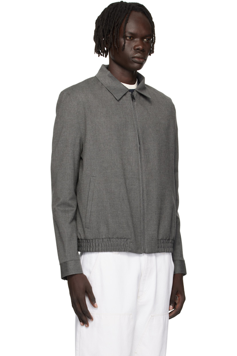 Stretch flannel jacket.

· Spread collar
· Zip closure
· Welt pockets at front
· Elasticized hem
· Press-stud cuffs
· Welt pocket at interior
· Full satin lining

Supplier color: Medium grey