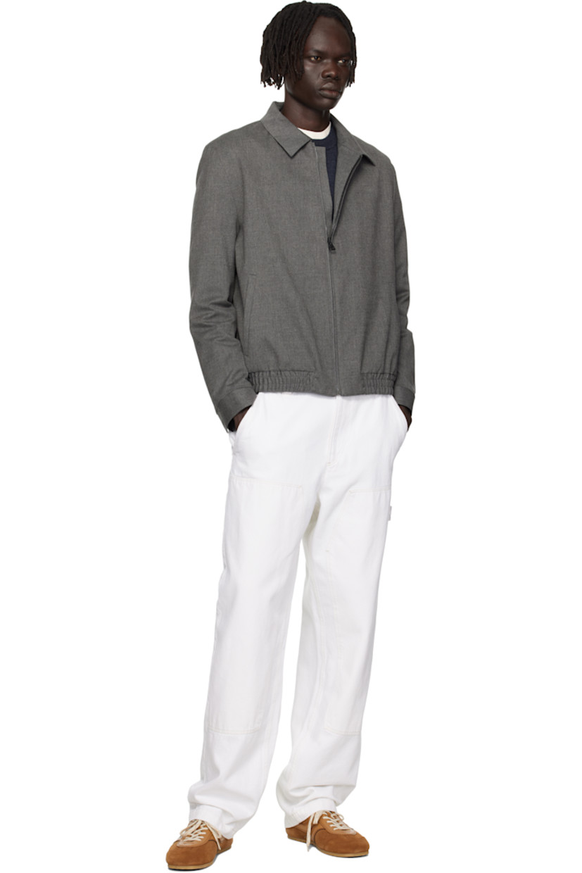 Stretch flannel jacket.

· Spread collar
· Zip closure
· Welt pockets at front
· Elasticized hem
· Press-stud cuffs
· Welt pocket at interior
· Full satin lining

Supplier color: Medium grey