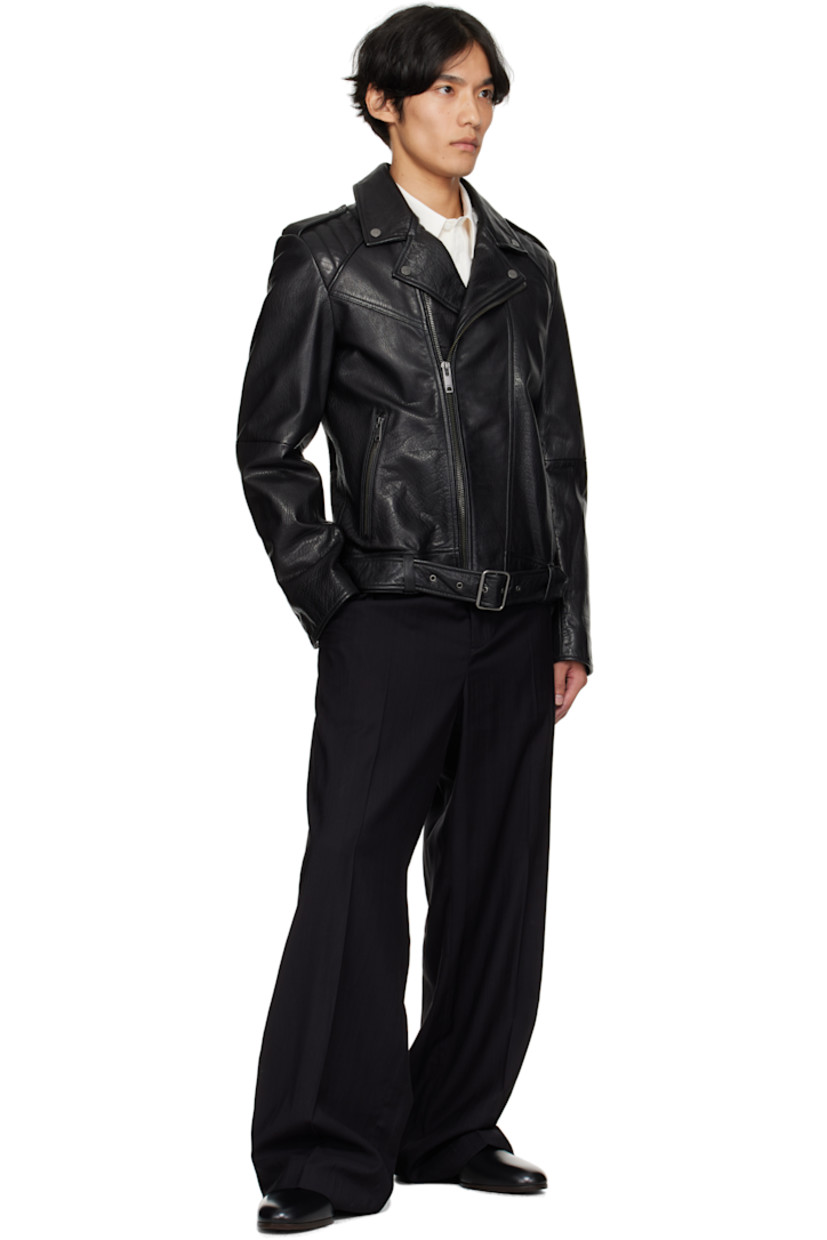 Grained buffalo leather jacket. 

· Notched lapel with press-stud fastening
· Zip closure
· Zip pockets at waist
· Integrated and adjustable belt at hem
· Press-stud epaulets at quilted shoulders
· Zip vent at cuffs
· Full satin lining
· Logo-engraved gunmetal-tone hardware

Supplier color: Black