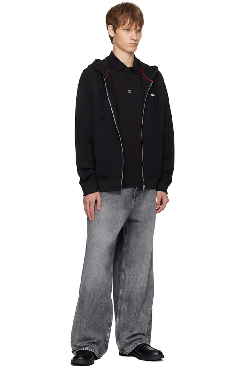 Non-stretch denim jeans.

· Fading throughout
· Belt loops
· Five-pocket styling
· Button fly
· Logo plaque at coin pocket
· Leather logo patch at back waistband
· Logo-engraved black hardware

Supplier color: Dark grey