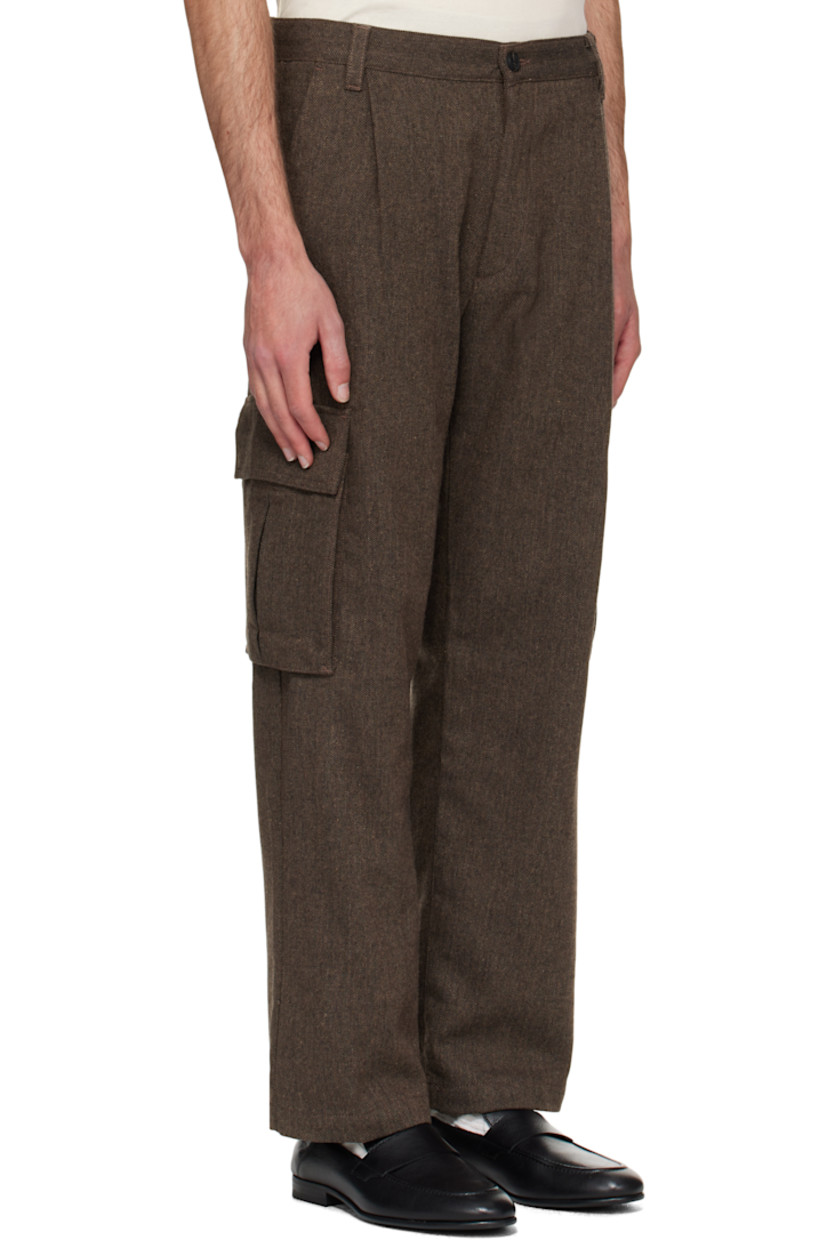 Recycled wool-blend herringbone trousers.

· Belt loops
· Four-pocket styling
· Flap pocket at outseams
· Zip fly

Supplier color: Medium brown