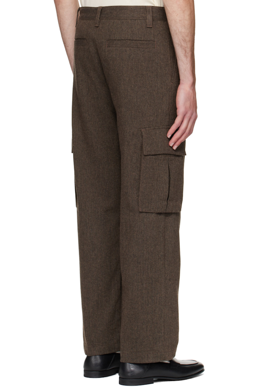 Recycled wool-blend herringbone trousers.

· Belt loops
· Four-pocket styling
· Flap pocket at outseams
· Zip fly

Supplier color: Medium brown
