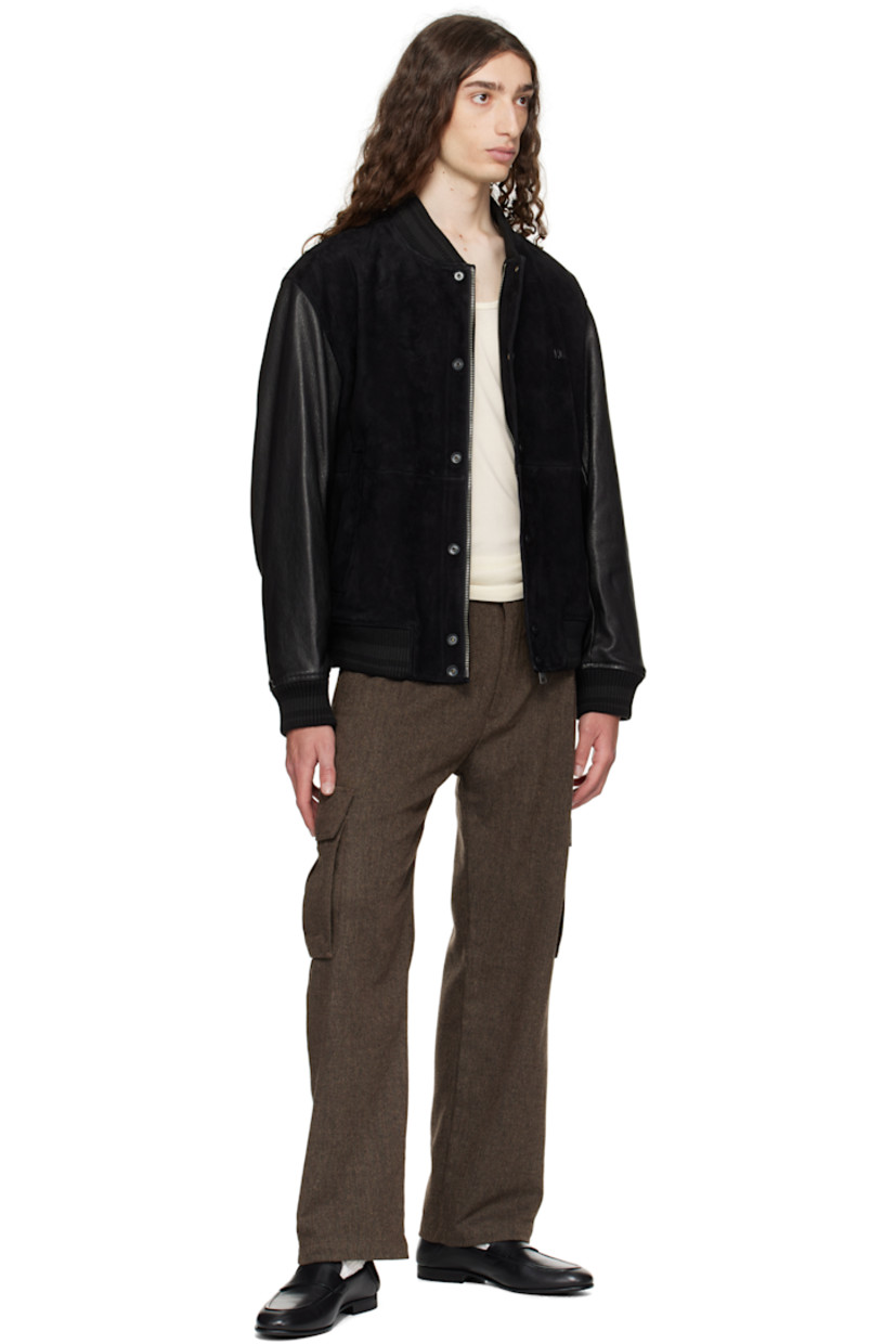 Recycled wool-blend herringbone trousers.

· Belt loops
· Four-pocket styling
· Flap pocket at outseams
· Zip fly

Supplier color: Medium brown