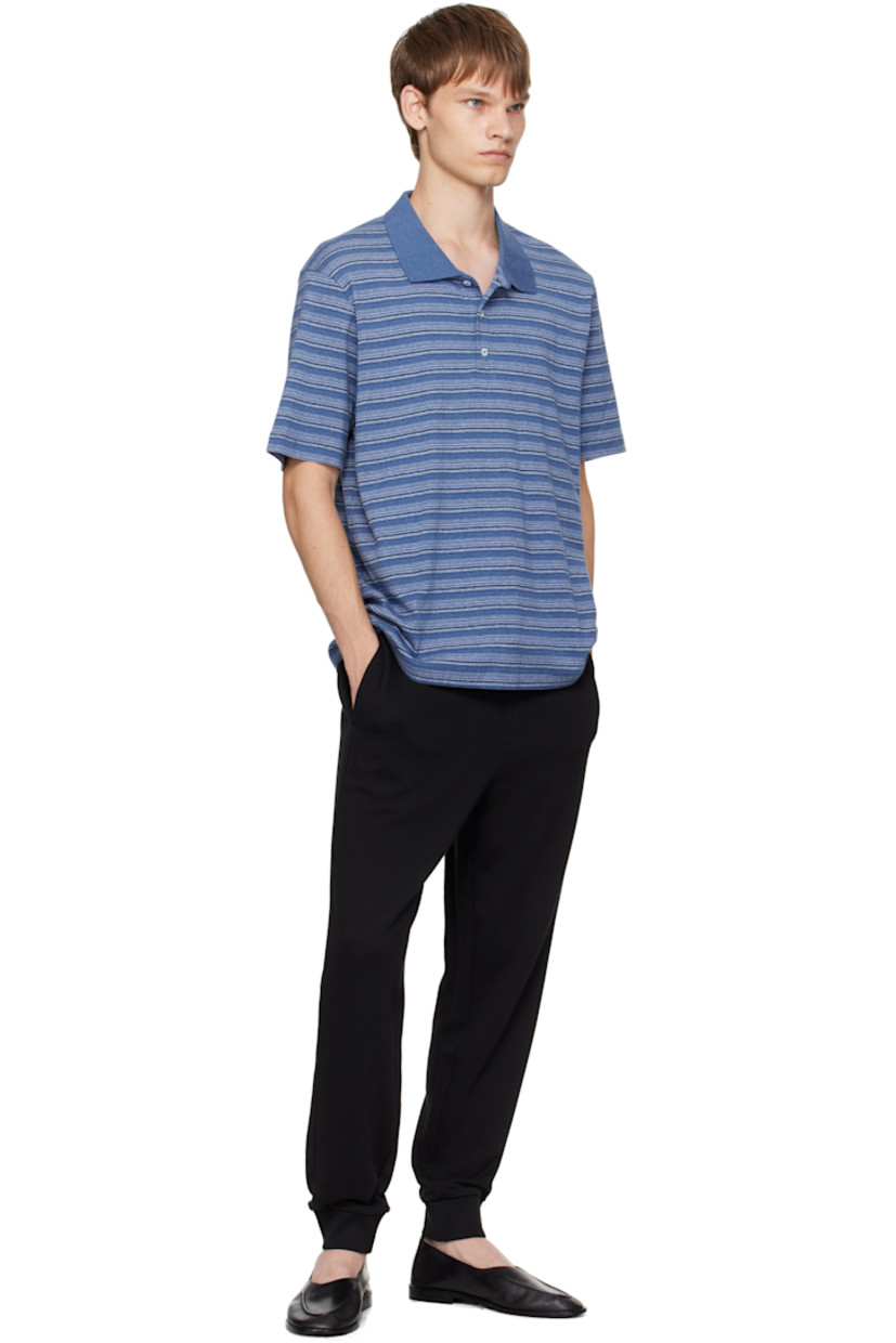 Cotton French terry sweatpants.

· Mid-rise
· Drawstring at elasticized rib-knit waistband
· Two-pocket styling
· Logo bonded at leg
· Rib-knit cuffs

Supplier color: Black
