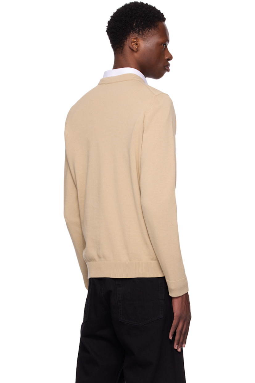 Knit cotton sweater. 

· Rib-knit crewneck, hem, and cuffs
· Embroidered logo patch at chest 

Supplier color: Medium beige