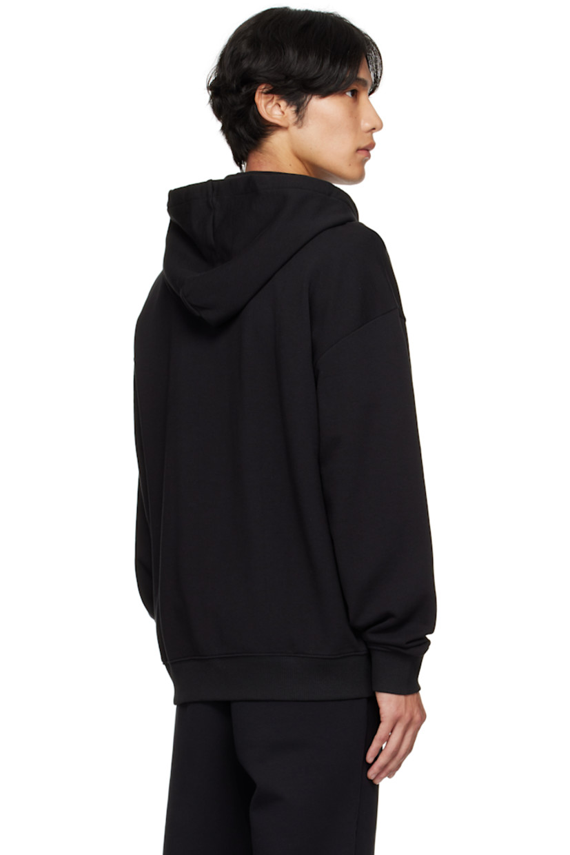 French terry hoodie.

· Drawstring at hood
· Zip closure
· Bonded logo at chest
· Patch pockets
· Rib-knit hem and cuffs
· Dropped shoulders
· Logo-engraved silver-tone hardware

Supplier color: Black